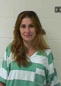 Woman arrested for battery on officer & damaging patrol car