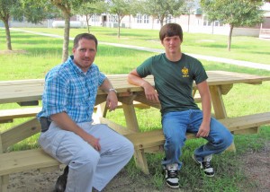 Toren Guthrie builds tables for Tolar for Boy Scout projec