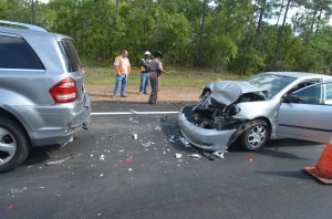 Car rear-ends van stopped in construction zone