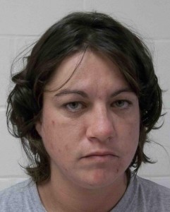 Woman arrested in shooting death